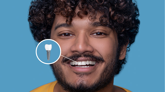 The image shows a person with curly hair, smiling at the camera, with a toothbrush highlighted in the upper right corner.